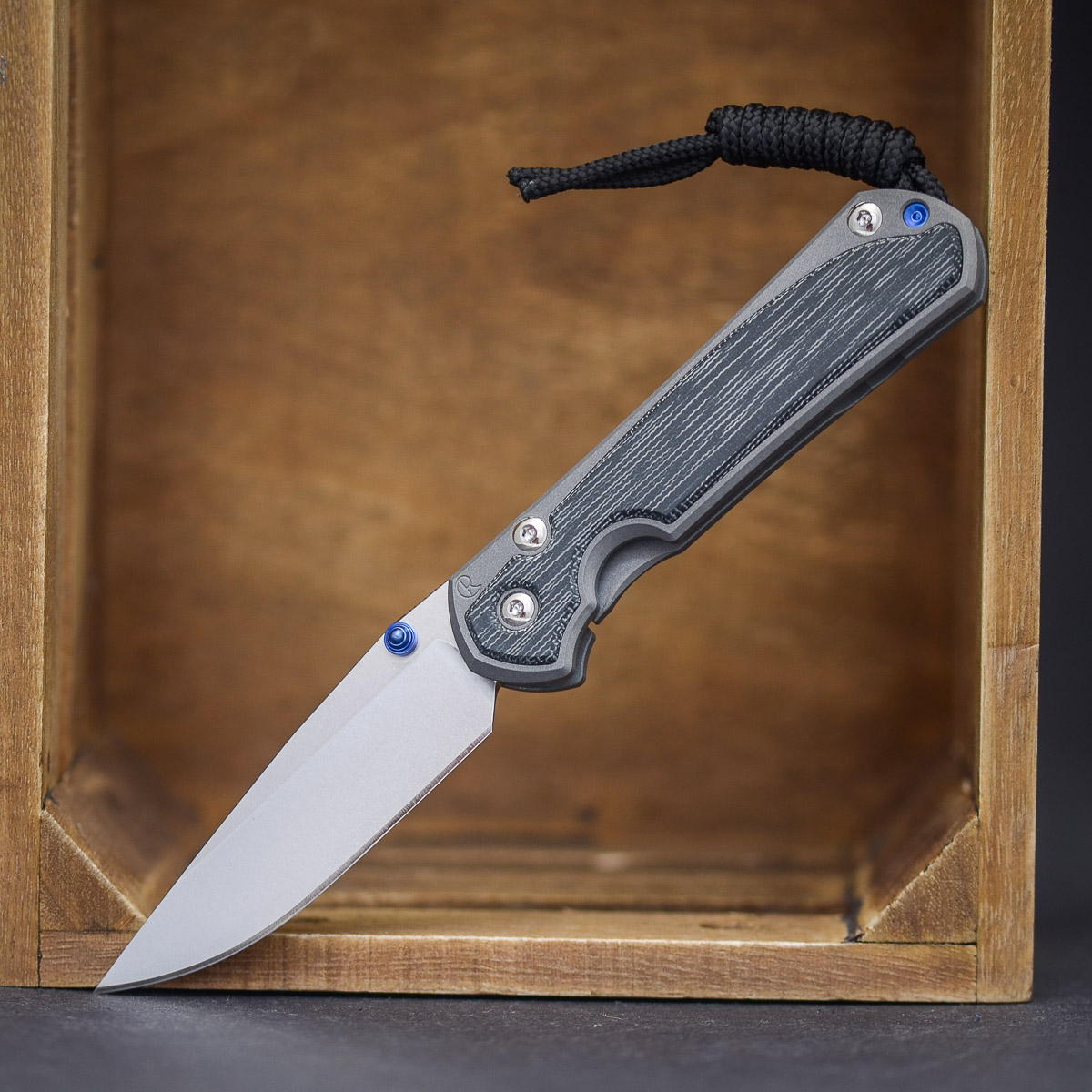 Chris Reeve Sebenza 31 Canvas Micarta Black Double Lug - Blue Hardware Chris Reeve Sebenza 31 Canvas Micarta Black Double Lug - Blue Hardware