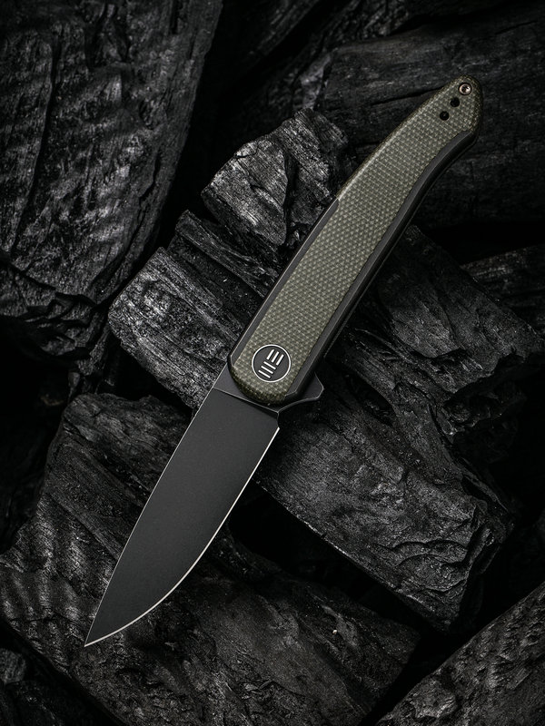 1633924235276650 WE Smooth Sentinel Schwarz mit grünem Micarta Inlay